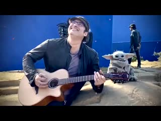 robert rodriguez plays guitar for baby yoda